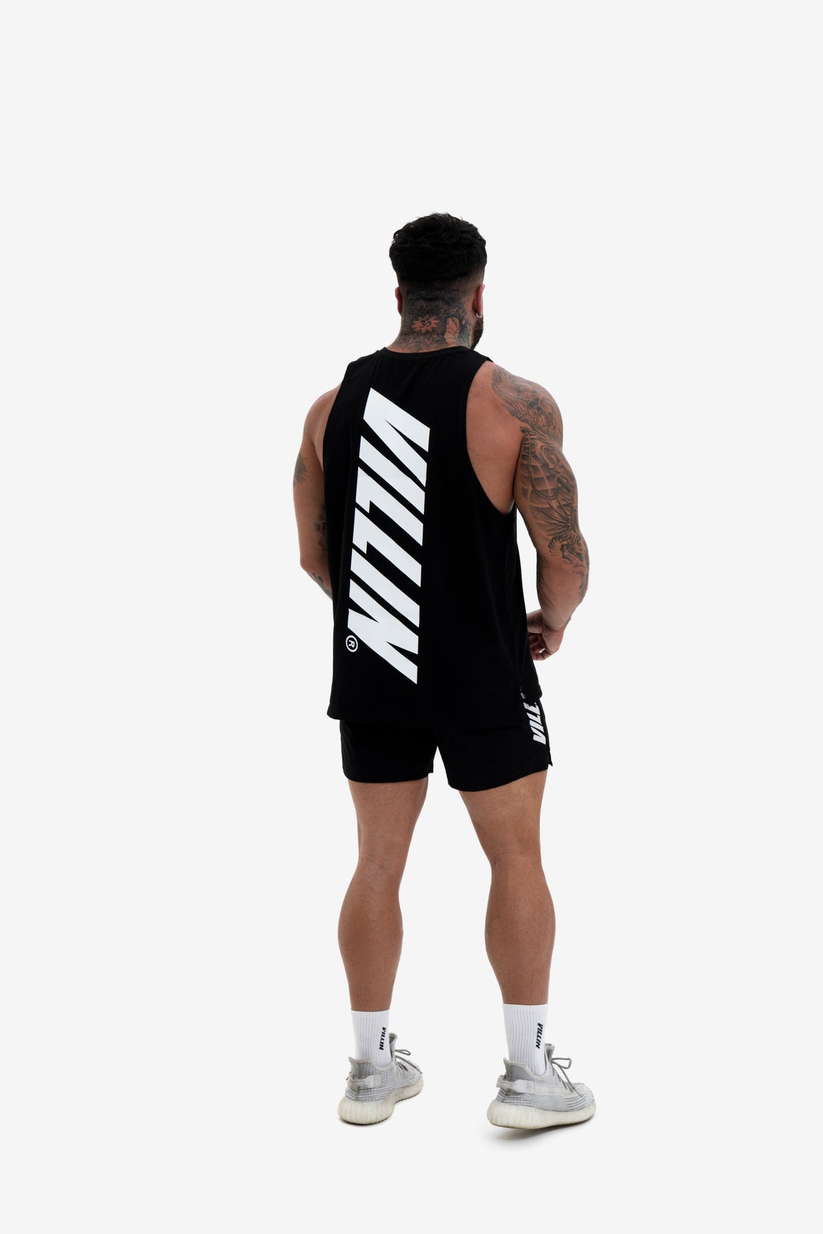 VILLIN Tank in Black — back view, male model
